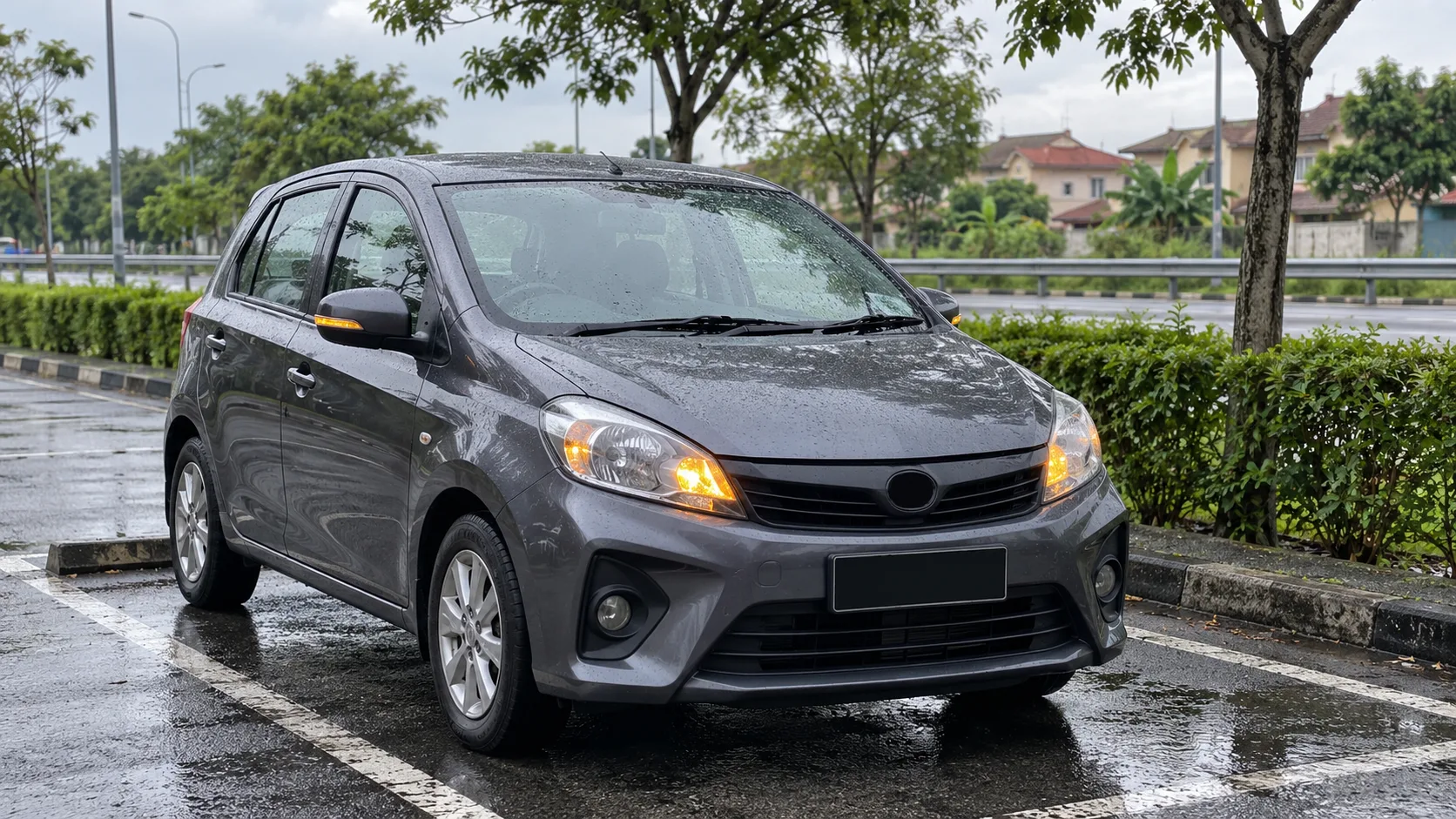 Generic compact car parked safely in a marked parking bay after rain